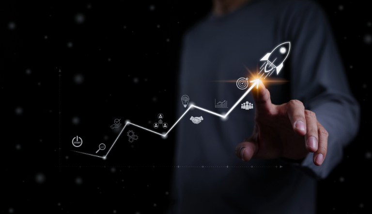 Business Services Program Growth Chart with Rocket Symbolizing Success